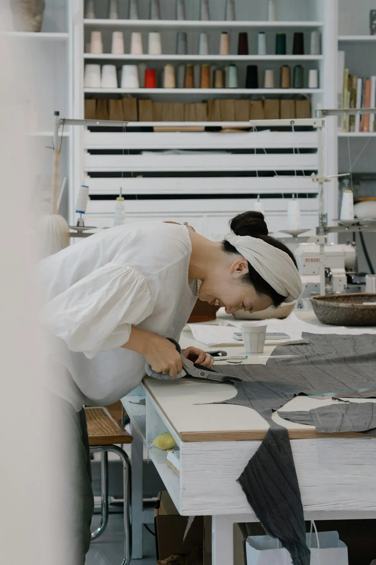 Local workshop sewing custom beige fabric